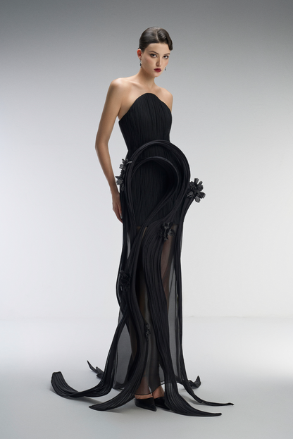 A black gown with floral details