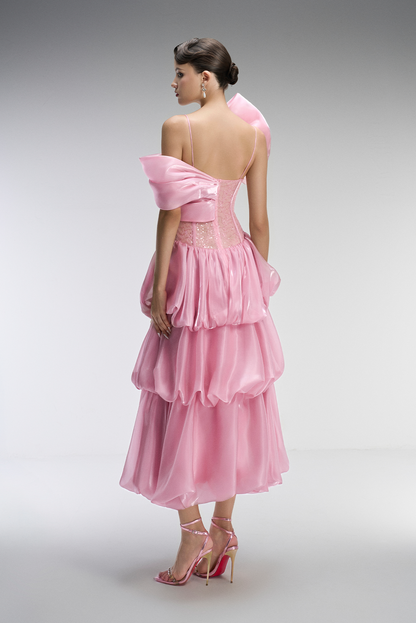 Pink dress with a large bow detail