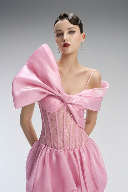 Pink dress with a large bow detail