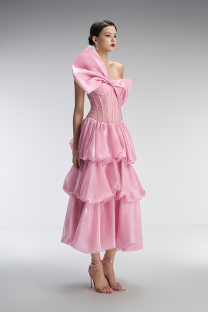 Pink dress with a large bow detail