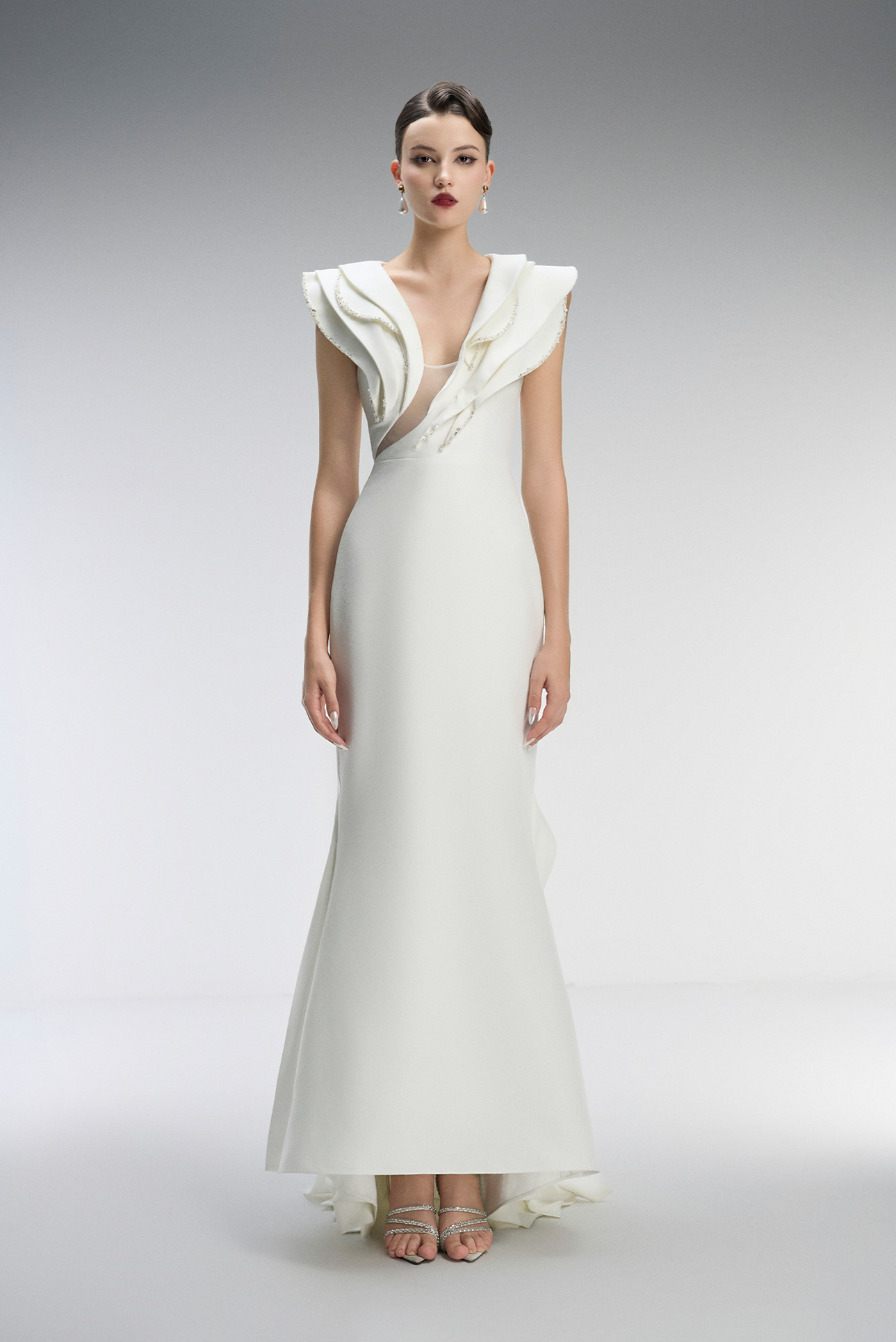 White dress with ruffled details