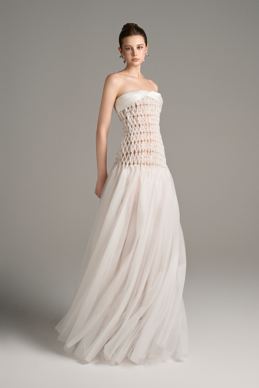 Front view of strapless drop waist maxi dress with criss-cross bodice and tulle skirt