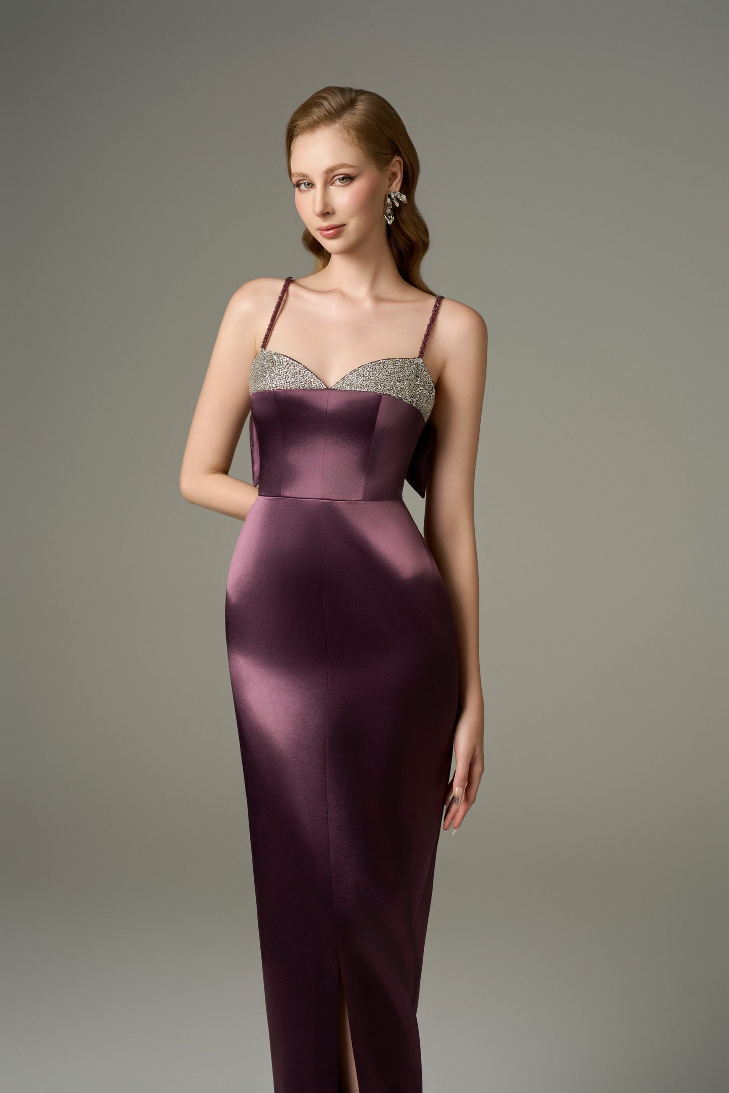 A close-up front view of a Diana purple bodycon Tencel silk maxi dress, highlighting the handcrafted crystal embellishments on the bust and the spaghetti straps.