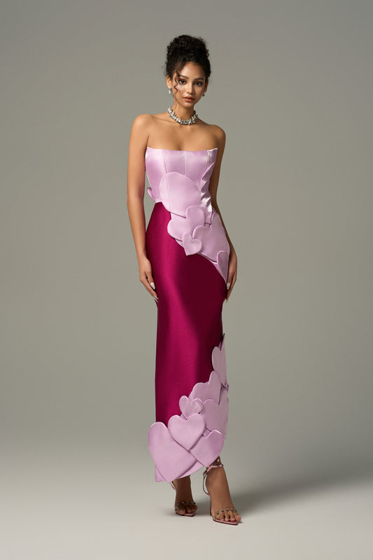 Purple & Pink Heart Maxi Dress is designed in luxurious taffeta fabric, combining shimmering purple and pale pink tones.