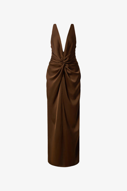 The brown silk maxi dress detailed with a deep V-neck and innovative 3D twist at the waist. 