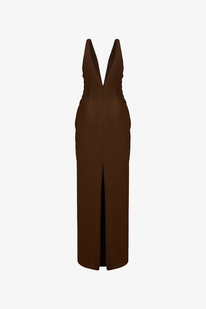 The brown silk maxi dress detailed with a deep V-neck and innovative 3D twist at the waist. 