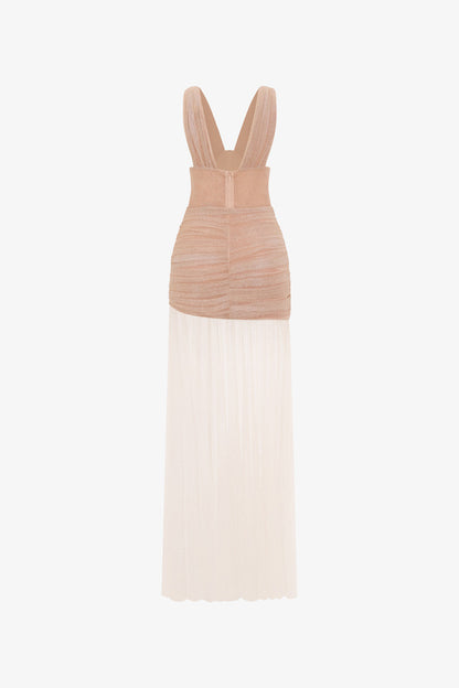 the beige evening dress in shimmering fabric, featuring a sheer, flowing skirt, cut-outs.