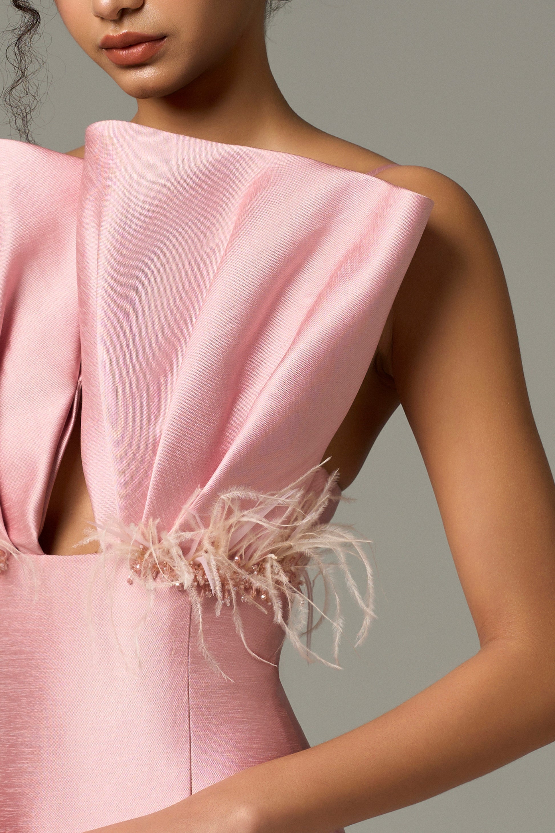 The Pink Feather & Crystal Embellished Maxi Dress features a delicate bow detailing on the bust cup.