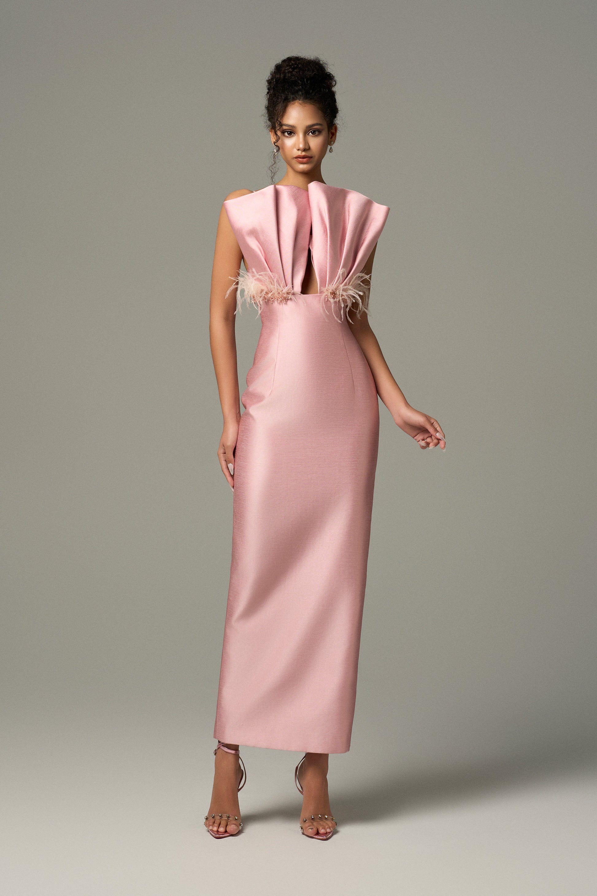 The Pink Feather & Crystal Embellished Maxi Dress features a delicate bow detailing on the bust cup.