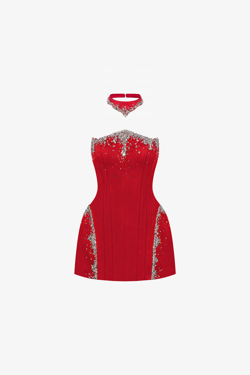 The red mini dress with a wavy neckline, puffed hips, sparkling embellishments, and an intricately designed choker. 