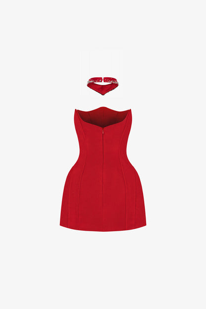 The red mini dress with a wavy neckline, puffed hips, sparkling embellishments, and an intricately designed choker. 