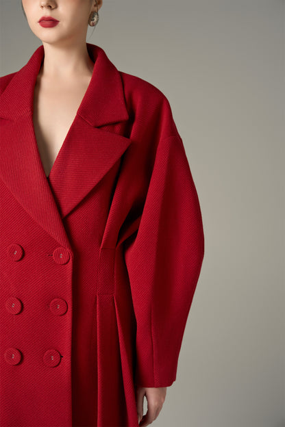 The Red Oversize Felt Texture Coat features a relaxed silhouette with a shawl collar and double-breasted front.