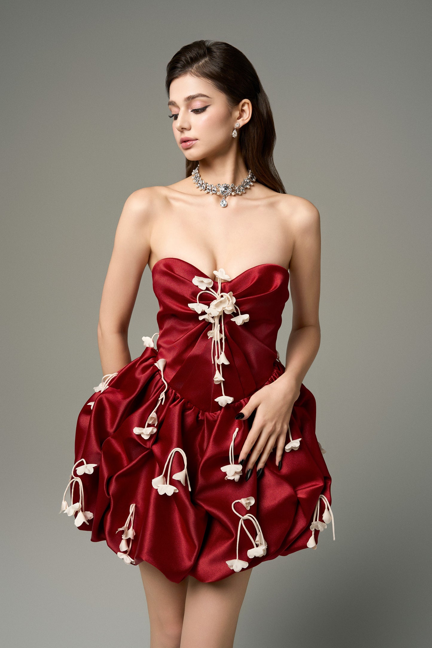 Red Silk Strapless 3D Floral Mini Dress features delicate pleating, a flared skirt with smocking details, and handmade silk flowers