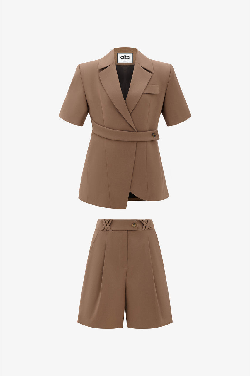 The short-sleeve brown blazer with wide padded shoulders and short menswear with chic waistband detail.