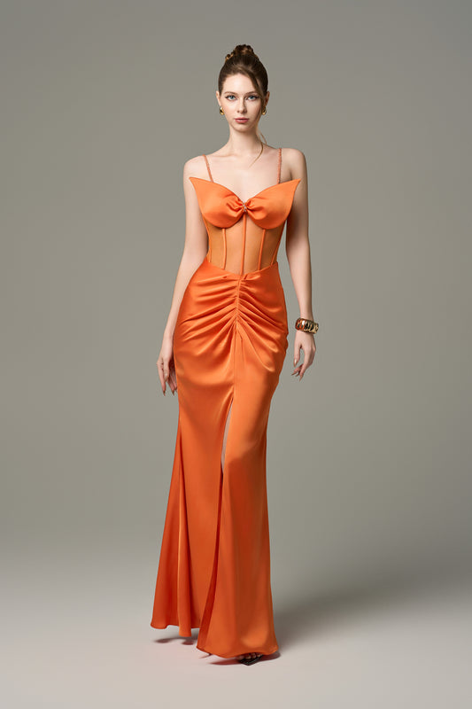 The Silk Mesh Corset Ruched Front Orange Gown with Crystals adorn the straps and bust. 