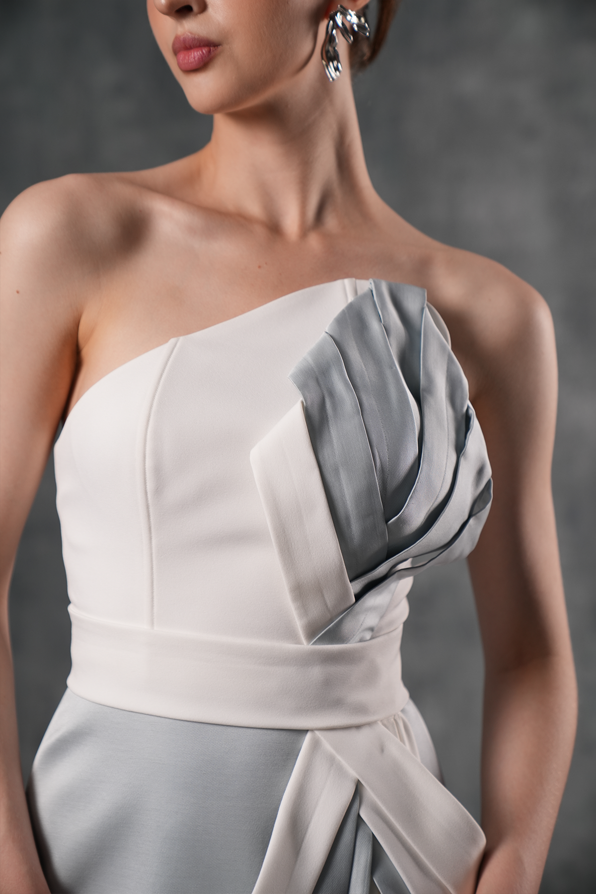 Marga Asymmetrical Neckline Draped Mini Dress With Side Train